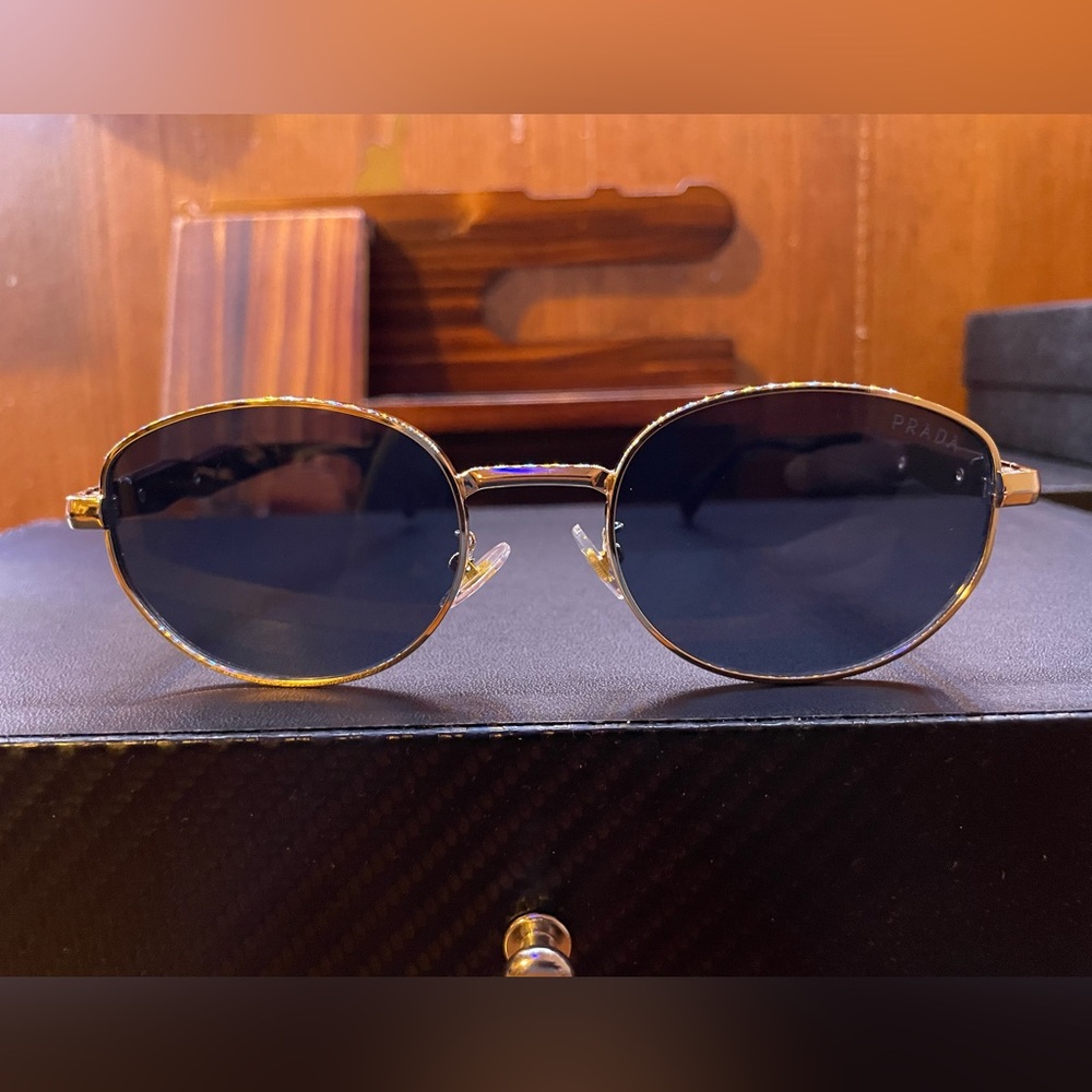 Prada 65ZS/Oval gold/black lens 
Prada double box